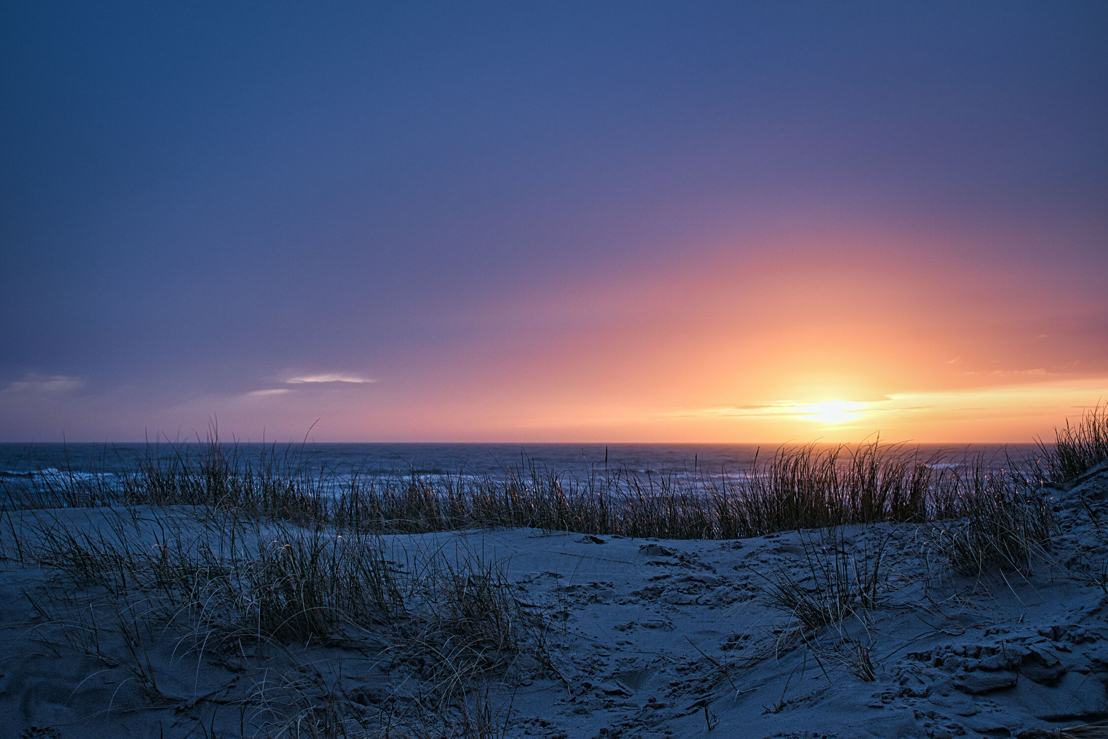 Bild mit Sonnenuntergang, Urlaub, Strand, Meer, Dänemark